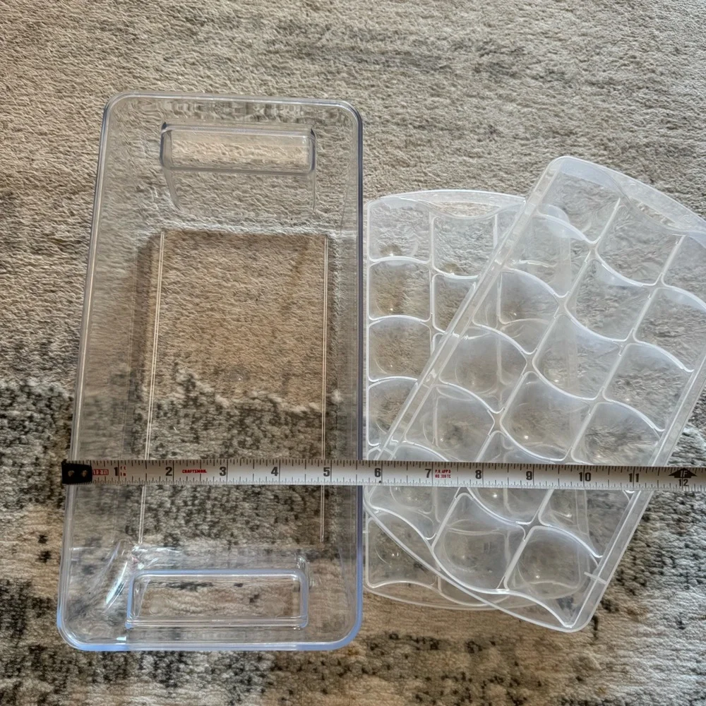 Bundle of 2 ice cube trays and plastic storage bin